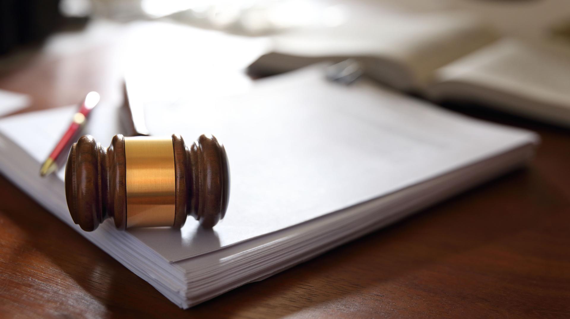 Gavel On Stack Of Legal Documents